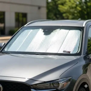 The reflective silver surface captured during a weathertech sunshade review to show UV protection.
